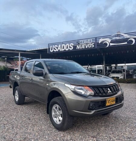 
								Mitsubishi L200 full									
