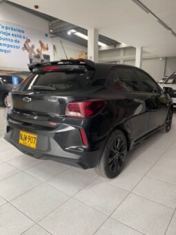 
										Chevrolet Onix Rs full									